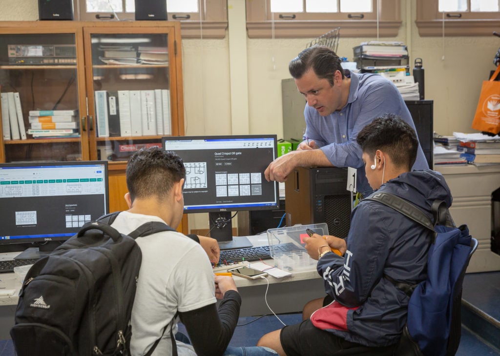 Ryan Flores teaches Digital Electronics at John Muir High School in Pasadena, Calif. He is one of the many STEM professionals who have transitioned to teaching jobs through EnCorps.