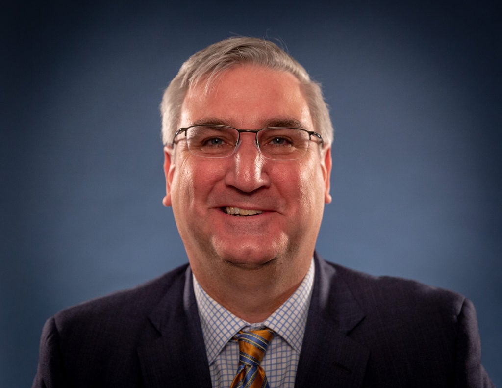 Photo of Indiana Gov. Eric Holcomb who brought over The Last Mile to Indiana.