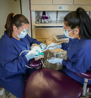 Dental Health Aide Therapists work on patient's teeth.