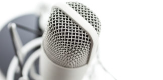 podcast microphone on white background