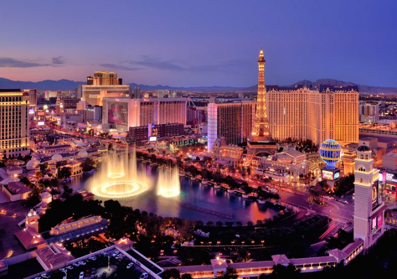 USA, Nevada, Las Vegas, Elevated view of illuminated cityscape with Fountains of Bellagio
