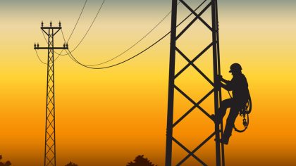 lineworker at sunset